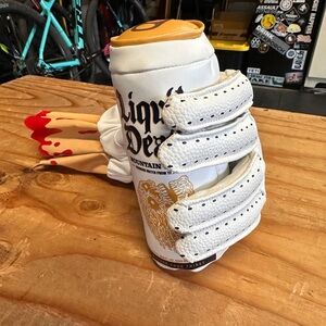 Liquid Death severed hand driver cover